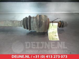 Ssang Yong Rodius Aandrijfas links-achter O374890 foto 2