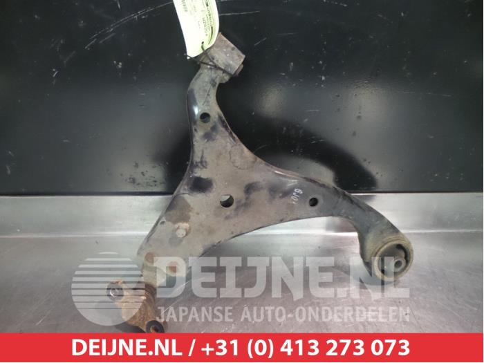 Kia Carens Front lower wishbone, right O382370