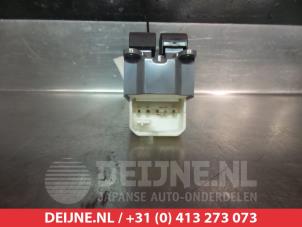Toyota Verso-S Multi-functional window switch O312544 photo 2
