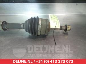 Nissan Primera Aandrijfas rechts-voor O319252 foto 2