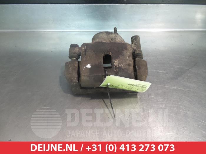 Mazda 323 Bremszange links vorne O324570