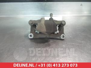 Mitsubishi Grandis Rear brake calliper, left O376451 photo 2