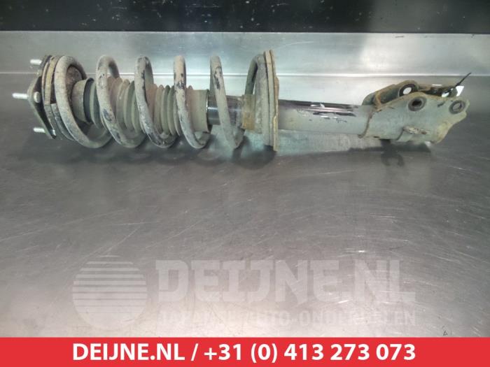 Mazda CX-7 Schokdemperpoot links-voor O320345