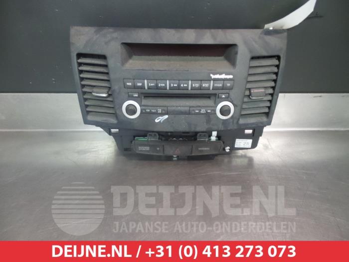 Mitsubishi Lancer Radiobedienings paneel O312590