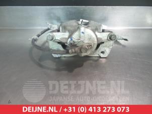 Toyota Auris Bremszange links vorne O325730 foto 2