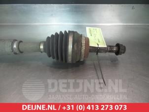 Toyota Corolla Verso Aandrijfas rechts-voor O320104 foto 2