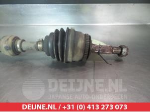 Kia Rio Aandrijfas links-voor O317996 foto 2