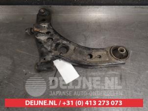 Subaru Justy Front lower wishbone, right O382273 photo 2