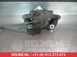 Kia Rio Bremszange links vorne O325020 foto 2
