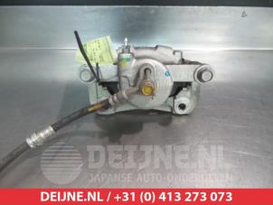 Mazda 2 Bremszange links vorne O324652 foto 2