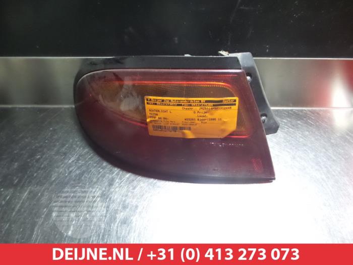 Mazda 323F Achterlicht links O297383