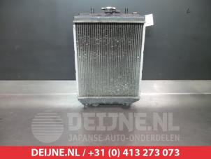 Gebruikte Radiateur Daihatsu Cuore (L251/271/276) 1.0 12V Prijs € 50,00 Margeregeling aangeboden door V.Deijne Jap.Auto-onderdelen BV