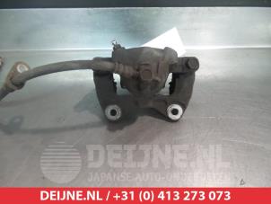Daihatsu Sirion Bremszange links vorne O325407 foto 2