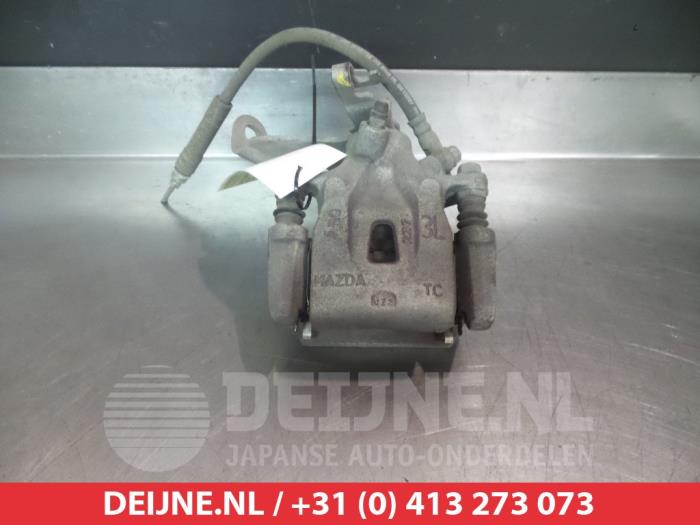Mazda CX-5 Remklauw (Tang) links-achter O375988