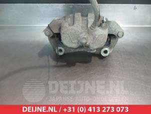 Nissan Navara Bremszange links vorne O324942 foto 2