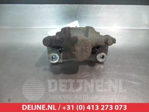 Toyota Previa Bremszange rechts hinten O377305 foto 2
