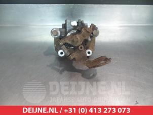 Toyota Urban Cruiser Rear brake calliper, left O376618 photo 2