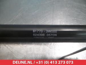 Kia Sportage Gasdemper links-achter O293991 foto 2