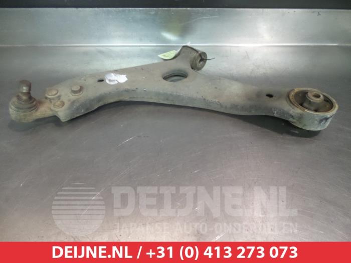Kia Sportage Draagarm onder links-voor O381383