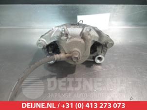 Nissan Pulsar Bremszange links vorne O324903 foto 2