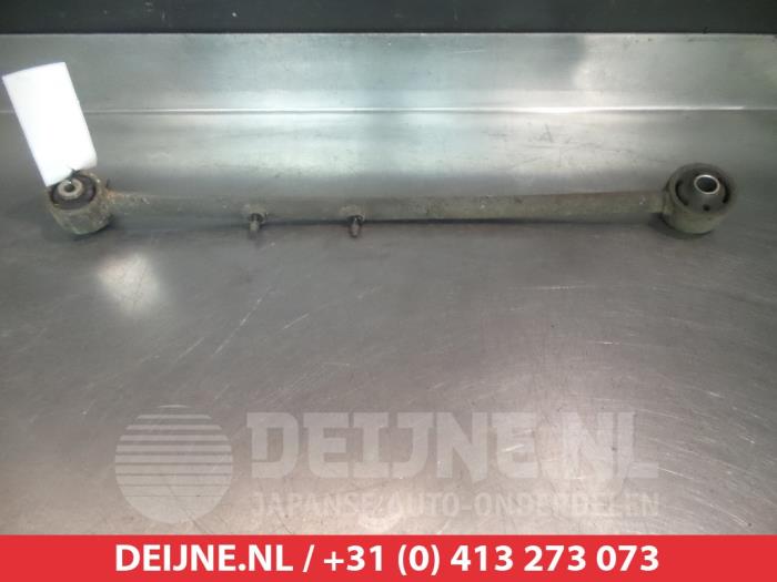 Kia Carens Draagarm links-achter O383467