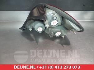 Hyundai Coupe Achterlicht links O297633 foto 2