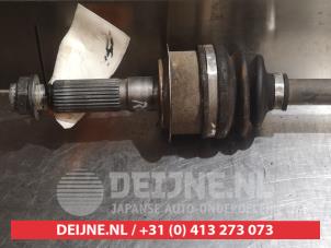 Subaru Impreza Aandrijfas rechts-achter O375105 foto 2