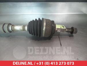 Nissan Primera Aandrijfas rechts-voor O319264 foto 2