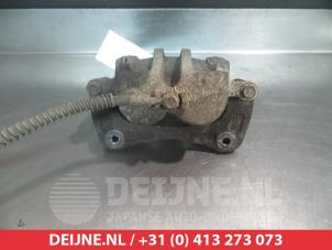 Ssang Yong Rodius Bremszange links vorne O325148 foto 2