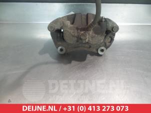 Nissan Pathfinder Remklauw (Tang) links-voor O324935 foto 2