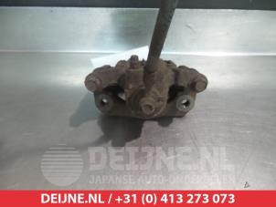 Nissan Pathfinder Rear brake calliper, left O376210 photo 2