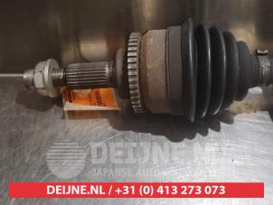 Suzuki Liana Antriebswelle links vorne O318437 foto 2