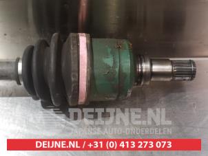 Suzuki Liana Aandrijfas links-achter O393184 foto 3