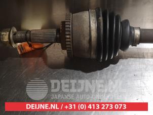 Nissan Primera Aandrijfas rechts-voor O319255 foto 2