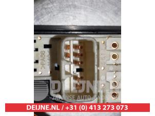 Subaru Justy Multi-functional window switch O311780 photo 2
