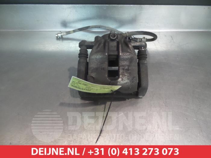 Nissan Note Front brake calliper, left O324810