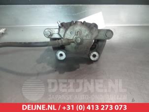 Nissan Note Front brake calliper, left O324810 photo 2