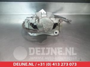 Toyota Auris Front brake calliper, left O325709 photo 2