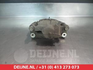 Subaru Impreza Bremszange links hinten O376229 foto 2