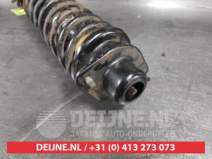 Nissan Micra Schokdemperpoot links-voor O320510 foto 2