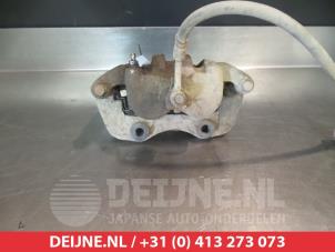 Nissan King Cab Front brake calliper, right O326192 photo 2