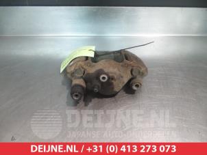 Mazda Demio Front brake calliper, left O324608 photo 2
