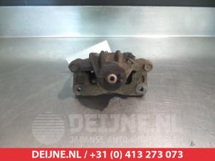 Hyundai Trajet Bremszange links hinten O376060 foto 2