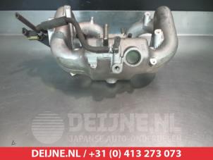 Suzuki Liana Inlaatspruitstuk O356516 foto 2
