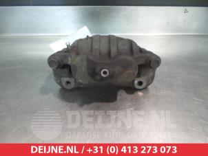 Mitsubishi Space Runner Front brake calliper, left O325216 photo 2