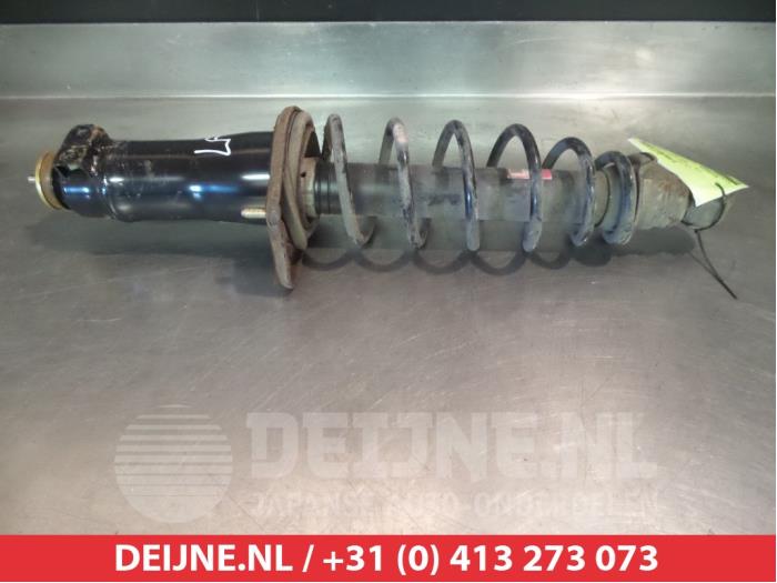 Mazda RX-8 Schokdemperpoot links-achter O377631