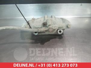 Toyota Yaris Front brake calliper, left O325582 photo 2