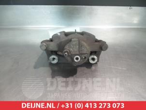 Toyota Aygo Bremszange links vorne O325671 foto 2