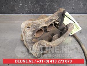 Mitsubishi Pajero Bremszange links vorne O325218 foto 2