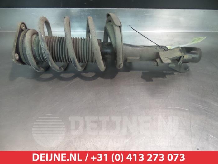 Mazda 3 Schokdemperpoot links-voor O320330